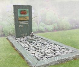 Grafmonument ruw steen en foto op glas