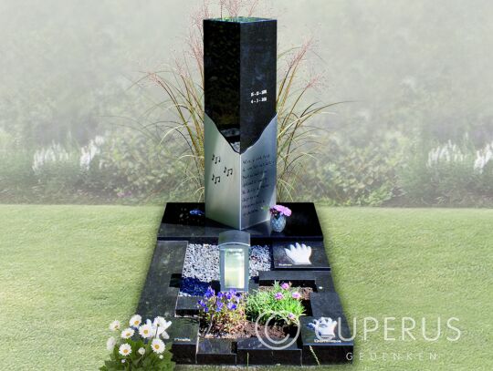 Modern RVS grafmonument met zuil