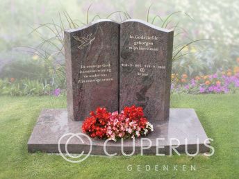 Grafmonument met golfkop van Paradiso graniet