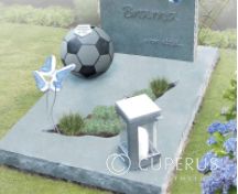 Kindermonument met voetbal en vlinders foto 4