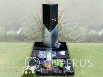 Modern RVS grafmonument met zuil