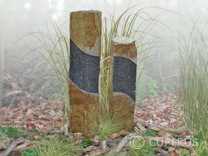 Twee grafmonumenten van bazalt als zuilen foto 1